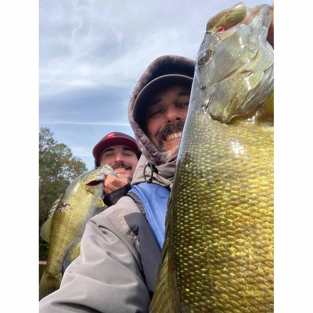 Hunter and Eric Enlow with a pair of Monticello smallies this week